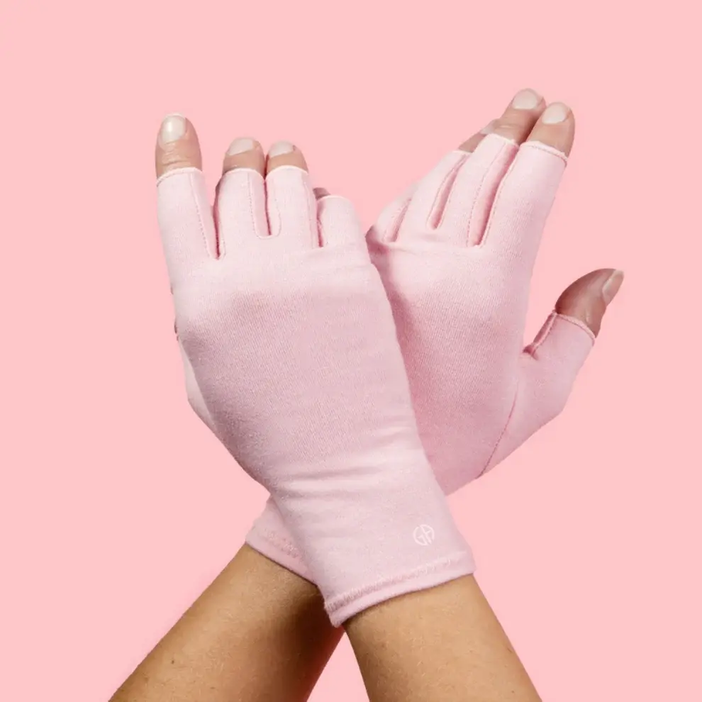 Compression gloves shown in pink